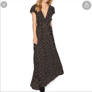 Black maxi dress with an orange geometric pattern